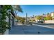 A neighborhood street view featuring a saguaro cactus and desert landscaping in the front yards at 14052 S 24Th Way, Phoenix, AZ 85048