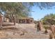 Backyard featuring desert landscaping, a block wall, and a covered patio at 14410 N Silverado Dr, Fountain Hills, AZ 85268