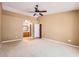 Spacious main bedroom with a ceiling fan and en suite bathroom at 14410 N Silverado Dr, Fountain Hills, AZ 85268