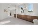 Bathroom with dual sink vanity with marble countertops and a glass enclosed shower at 1523 E Treasure Cove Dr, Gilbert, AZ 85234