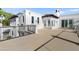 Exterior features a rooftop deck with wrought iron fence, stucco walls, and tile roof at 1523 E Treasure Cove Dr, Gilbert, AZ 85234