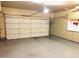 Spacious garage with built-in cabinets for storage and organization at 1750 W Union Hills Dr # 91, Phoenix, AZ 85027