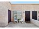 Apartment patio area featuring a small seating arrangement at 2117 W Pontiac Dr, Phoenix, AZ 85027