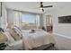 Bedroom featuring a large window with mountain views and neutral-colored walls at 21186 W Hillcrest Blvd, Buckeye, AZ 85396