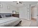 Bedroom featuring neutral walls, double door closet, dark colored furniture, and a decorative rug at 21186 W Hillcrest Blvd, Buckeye, AZ 85396