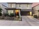Beautiful two-story home with a well-manicured front yard, inviting entrance, and a spacious two-car garage at 21186 W Hillcrest Blvd, Buckeye, AZ 85396