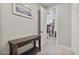 Hallway with decorative tile flooring and a view into the walk-in closet at 21186 W Hillcrest Blvd, Buckeye, AZ 85396