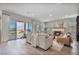 Inviting living room with a fireplace and sliding glass doors leading to the outdoors at 21186 W Hillcrest Blvd, Buckeye, AZ 85396