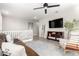 Spacious living room with hardwood floors, television, and comfortable seating at 21186 W Hillcrest Blvd, Buckeye, AZ 85396