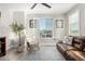 Comfortable living room featuring hardwood floors, natural light, and stylish decor at 21186 W Hillcrest Blvd, Buckeye, AZ 85396