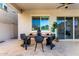 Covered patio with dining table and chairs, perfect for outdoor entertaining at 21186 W Hillcrest Blvd, Buckeye, AZ 85396