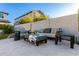 Cozy backyard patio area with comfortable seating and tiled flooring at 21186 W Hillcrest Blvd, Buckeye, AZ 85396
