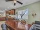 Kitchen and dining area combination with view of the stainless steel appliances and office at 23882 W Yavapi St, Buckeye, AZ 85326