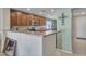 Kitchen featuring plentiful counter space and wood cabinetry at 23882 W Yavapi St, Buckeye, AZ 85326