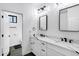 Bathroom with dual sinks, undermount lighting, and marble countertop at 2438 N 113Th St, Mesa, AZ 85207