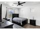 Bedroom with dark wood furniture and a large window at 2438 N 113Th St, Mesa, AZ 85207