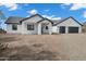 Attractive single-story home featuring a modern garage and manicured surroundings at 2438 N 113Th St, Mesa, AZ 85207