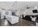 Bright, open-concept kitchen flowing into the living room, perfect for entertaining at 2438 N 113Th St, Mesa, AZ 85207