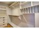 Organized closet with shelving, drawers, and hanging rods at 2542 S Playa --, Mesa, AZ 85202