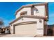 Charming home featuring a spacious two-car garage and well-maintained landscaping at 25732 W St James Ave, Buckeye, AZ 85326