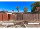 Assigned parking lot in the community featuring a parking spot behind a wooden privacy fence at 3120 N 67Th Ln # 31, Phoenix, AZ 85033