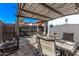 Backyard patio with a dining table and a barbecue at 3120 N 67Th Ln # 31, Phoenix, AZ 85033