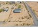 A detailed aerial view of the lot, showcasing the home, expansive grounds, and neighborhood surroundings at 31555 N Royce Rd, San Tan Valley, AZ 85144