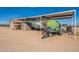 This outdoor area features a covered structure with a water tank at 31555 N Royce Rd, San Tan Valley, AZ 85144