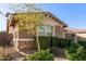 Beautiful home with mature landscaping and stone accents at 3254 N Park St, Buckeye, AZ 85396