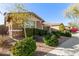 Beautiful home with mature landscaping and stone accents at 3254 N Park St, Buckeye, AZ 85396