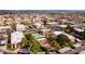 A picturesque aerial showcases the apartment complex, featuring amenities such as a pool and playground at 3601 W Tierra Buena Ln # 233, Phoenix, AZ 85053