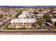 Expansive aerial view of the apartment complex, highlighting its tidy buildings and green spaces in a residential area at 3601 W Tierra Buena Ln # 233, Phoenix, AZ 85053