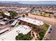 Aerial view shows well-maintained apartment buildings with convenient parking, surrounded by neighborhood amenities and scenic landscapes at 3601 W Tierra Buena Ln # 233, Phoenix, AZ 85053