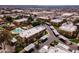 A captivating aerial view showcasing the community's layout, featuring a pool, playground, and convenient covered parking at 3601 W Tierra Buena Ln # 233, Phoenix, AZ 85053