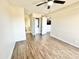 A bright bedroom offers convenient laundry and bathroom access at 3601 W Tierra Buena Ln # 233, Phoenix, AZ 85053