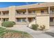 Inviting exterior showcasing the building's architecture with well-maintained landscaping and walkways at 3601 W Tierra Buena Ln # 233, Phoenix, AZ 85053