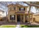 Inviting two-story home featuring a charming front porch, neutral color palette and drought tolerant landscaping at 3840 E Yeager Dr, Gilbert, AZ 85295