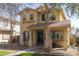 Inviting two-story home featuring a charming front porch, neutral color palette and drought tolerant landscaping at 3840 E Yeager Dr, Gilbert, AZ 85295