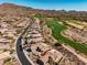 An aerial view of the home's community and the local golf course at 41921 N Crooked Stick Rd, Anthem, AZ 85086