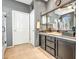 Stylish bathroom features dual sinks, a large mirror, neutral paint, and a separate shower stall at 41921 N Crooked Stick Rd, Anthem, AZ 85086