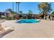 Enjoy the community pool with surrounding lounge chairs at 4201 E Camelback Rd # 34, Phoenix, AZ 85018