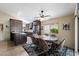 Charming dining area adjacent to the kitchen, featuring ample storage and a bright window view at 421 Leisure World --, Mesa, AZ 85206