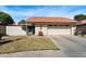 Inviting home with a two-car garage, gated courtyard, and xeriscaped front yard at 421 Leisure World --, Mesa, AZ 85206