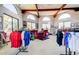 Retail area with displays of golf apparel and accessories, enhanced by natural light from large arched windows at 421 Leisure World --, Mesa, AZ 85206