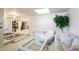 Cozy living area with carpet, a skylight, and a smooth transition into other parts of the home at 4349 E Stanford Dr, Phoenix, AZ 85018