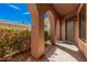 Covered arched entryway with tiled flooring, offering a shaded transition from the outdoors at 4376 S Summit E St, Gilbert, AZ 85297