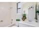 Relaxing bathroom featuring single vanity and tub shower combo at 4376 S Summit E St, Gilbert, AZ 85297