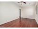 Spacious bedroom featuring hard wood flooring, neutral paint, and ceiling fan at 4376 S Summit E St, Gilbert, AZ 85297