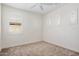 Carpeted bedroom with two windows providing ample natural light at 4376 S Summit E St, Gilbert, AZ 85297