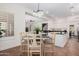 Bright dining room with an elegant chandelier and views of the kitchen at 4376 S Summit E St, Gilbert, AZ 85297